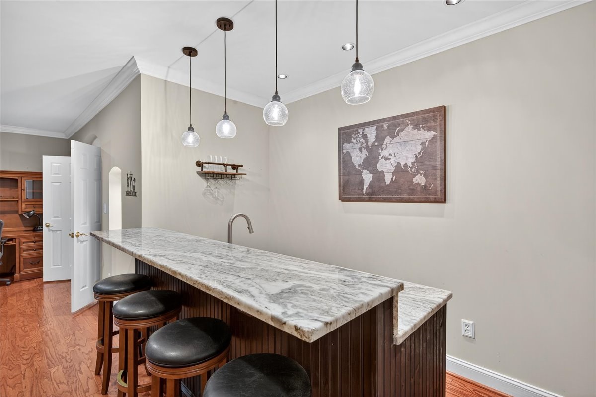 Convenient bar setup for entertaining downstairs.