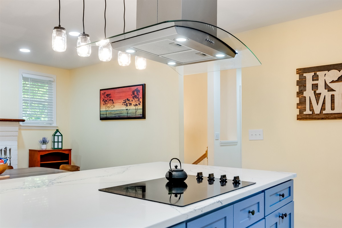 Fully Stocked Kitchen: Modern flair meets functionality in this bright space, perfect for culinary adventures!