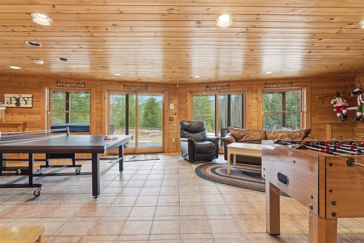 Head downstairs for even more room to relax, play, and hang out.