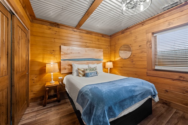 Lower Level Bedroom with Queen Bed & Bunkbed . Noise machine, Smart TV, ceiling fan.