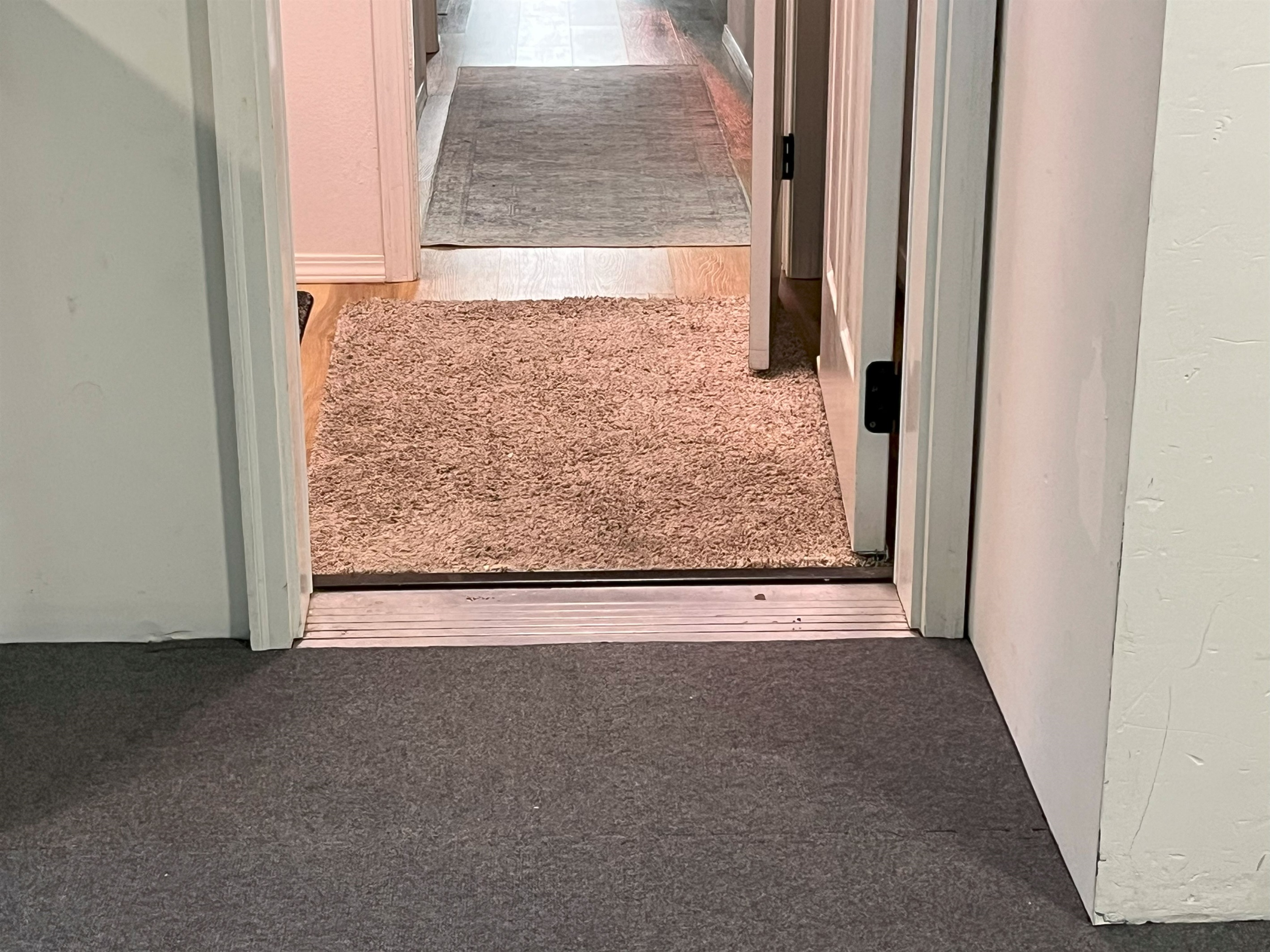 Step free entry is available if one person enters from front and opens garage/game room door from inside.