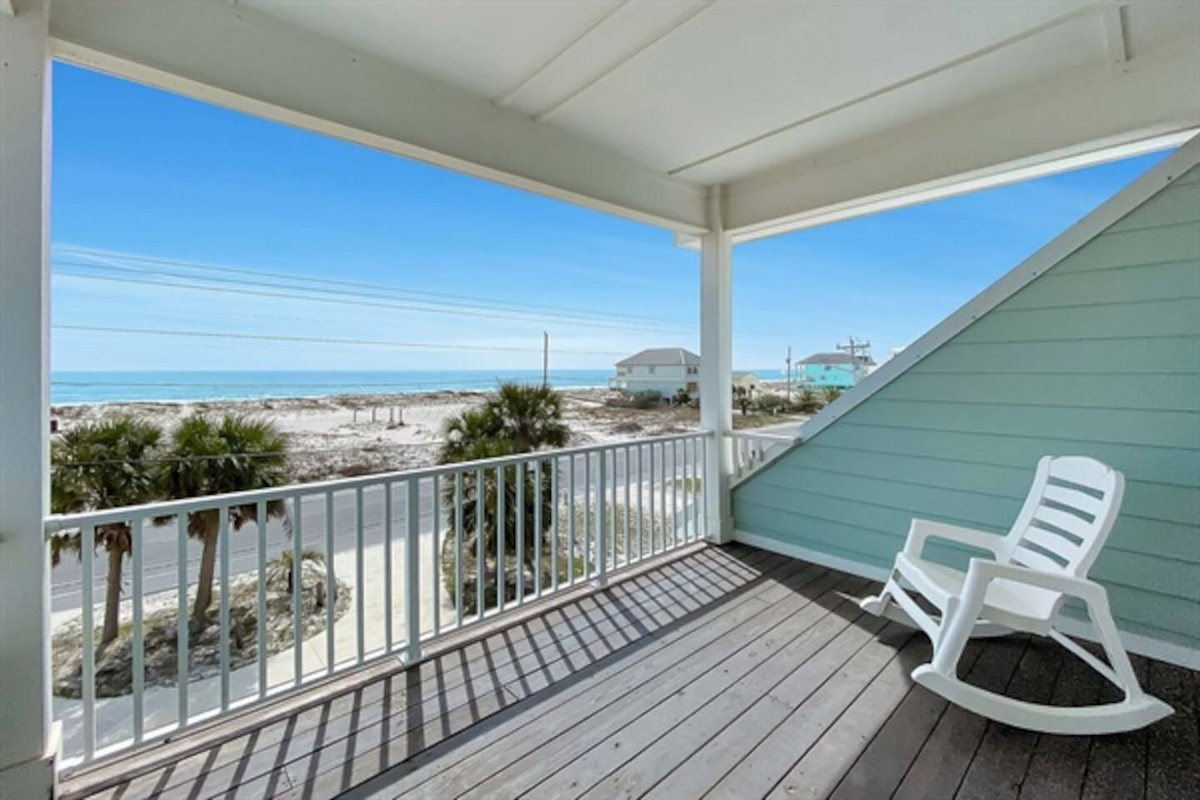 View from the front deck outside of one of the upstairs guest bedrooms.