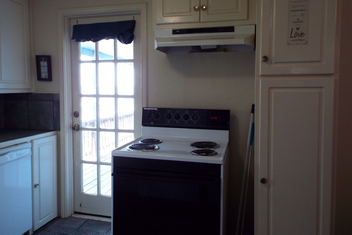 Kitchen with back door to deck