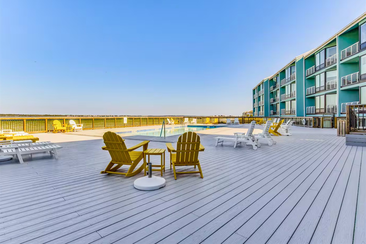 Lounge poolside and soak up the sun in a relaxed and spacious setting.