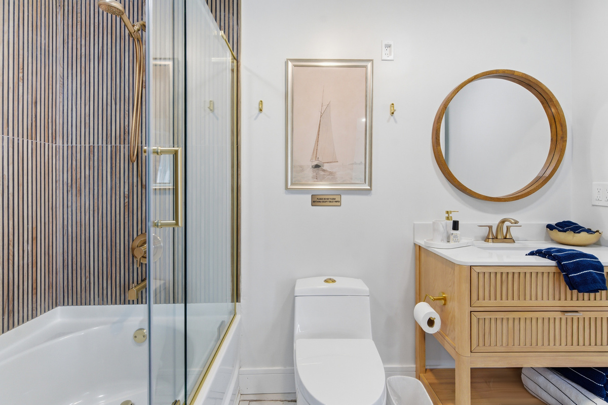 End your day in the serene spa inspired primary suite bath.
