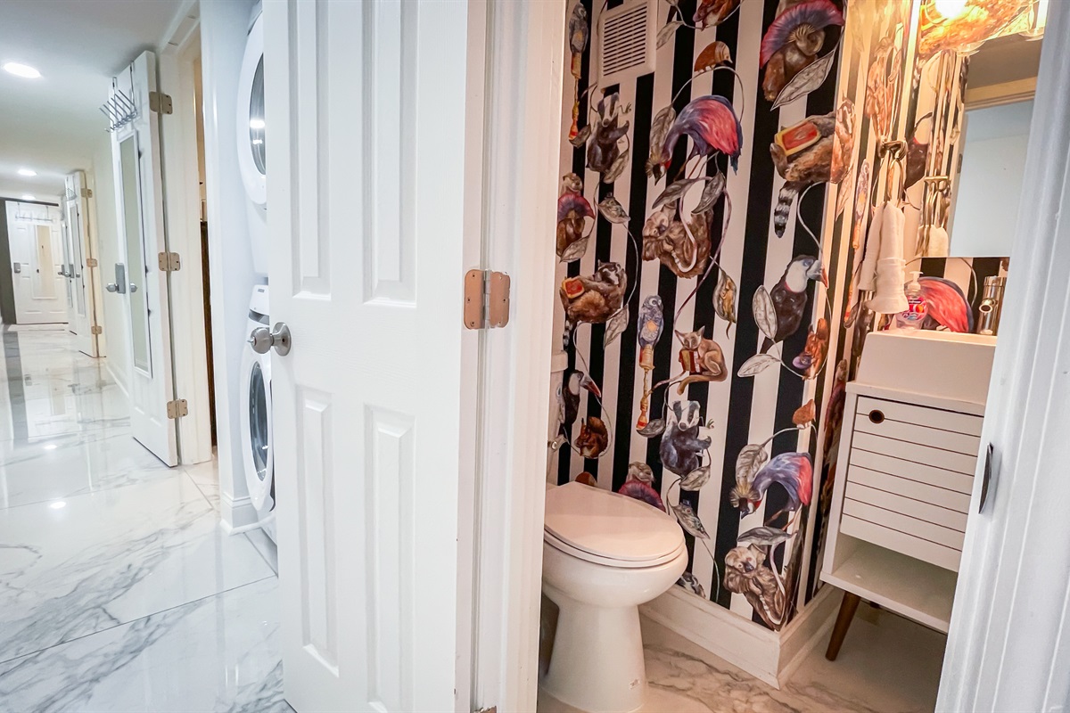 A full-size washer and dryer are also in the lower level, next to the half bathroom in the hallway