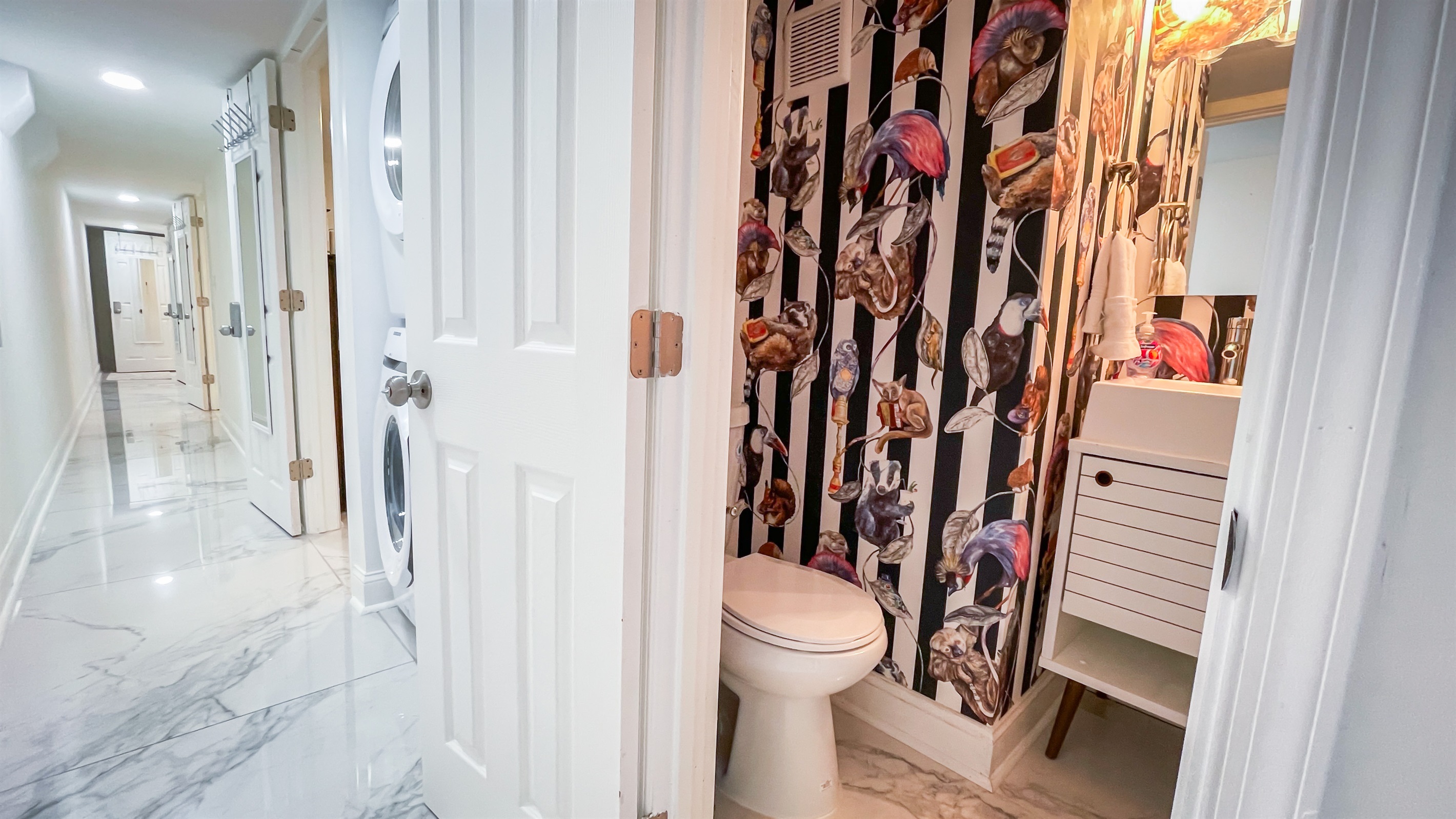 A full-size washer and dryer are also in the lower level, next to the half bathroom in the hallway
