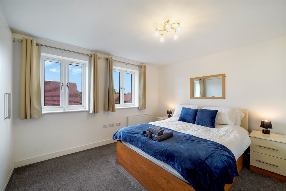 [Master bedroom, ensuite, x2 bedside table, built in wardrobes]
