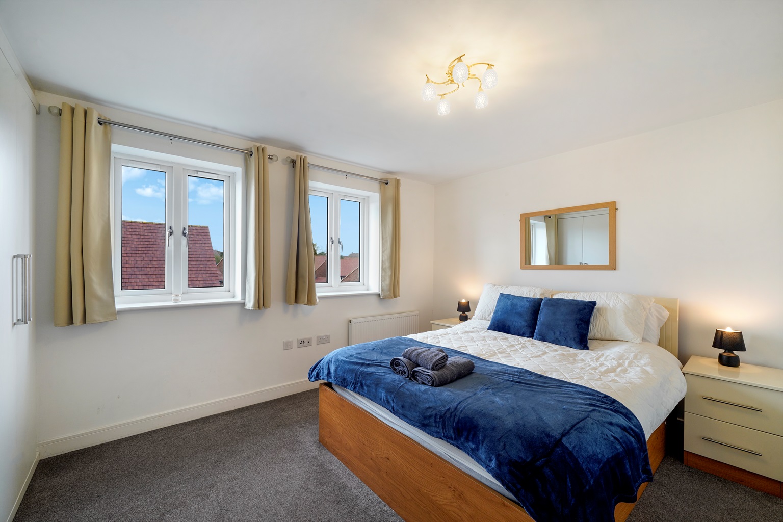[Master bedroom, ensuite, x2 bedside table, built in wardrobes]