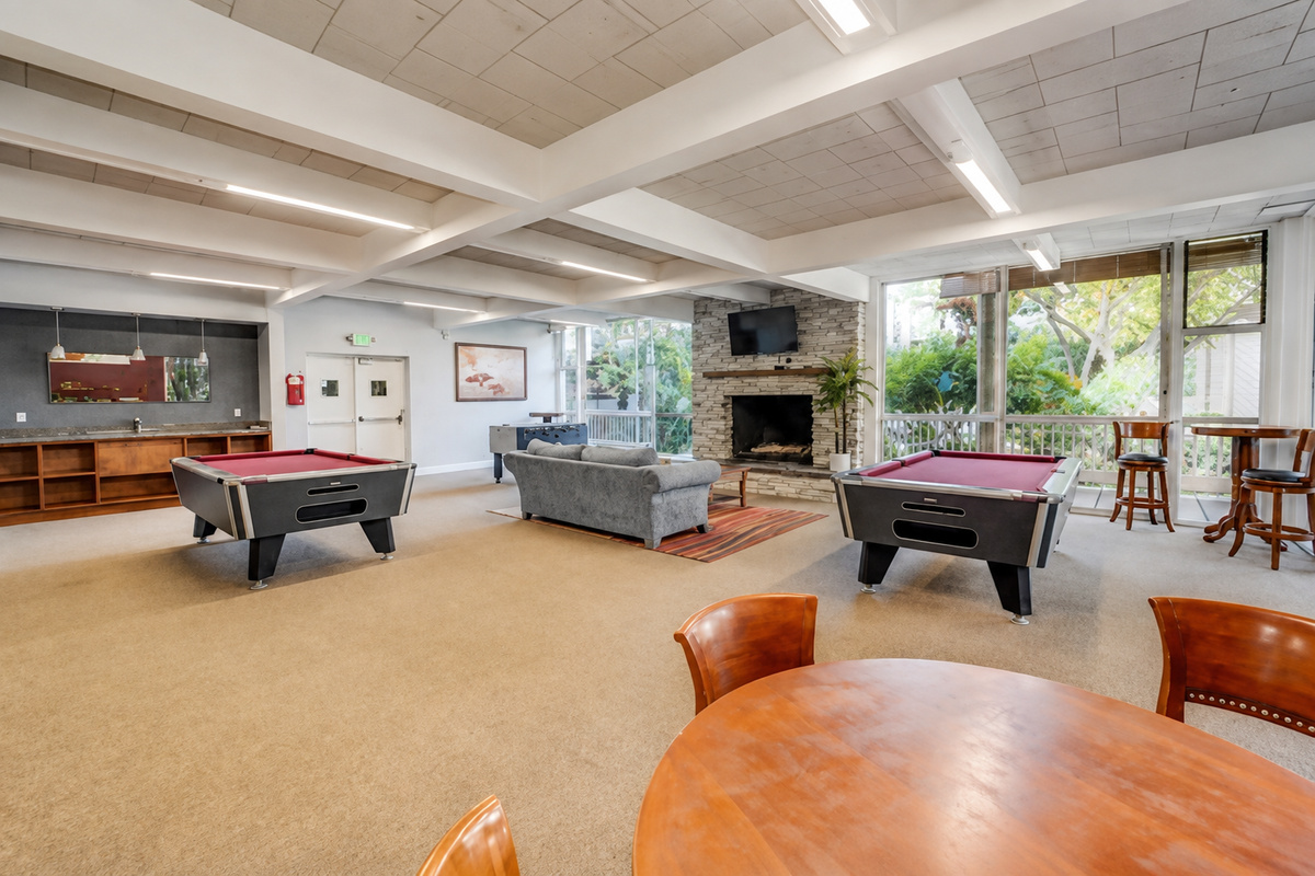 Game room with two pool tables