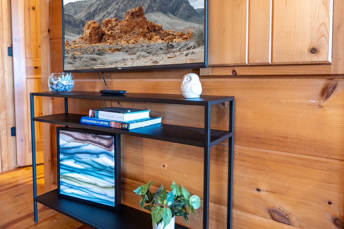 Enjoy entertainment even while dining! The main level features a smart TV in the dining area.