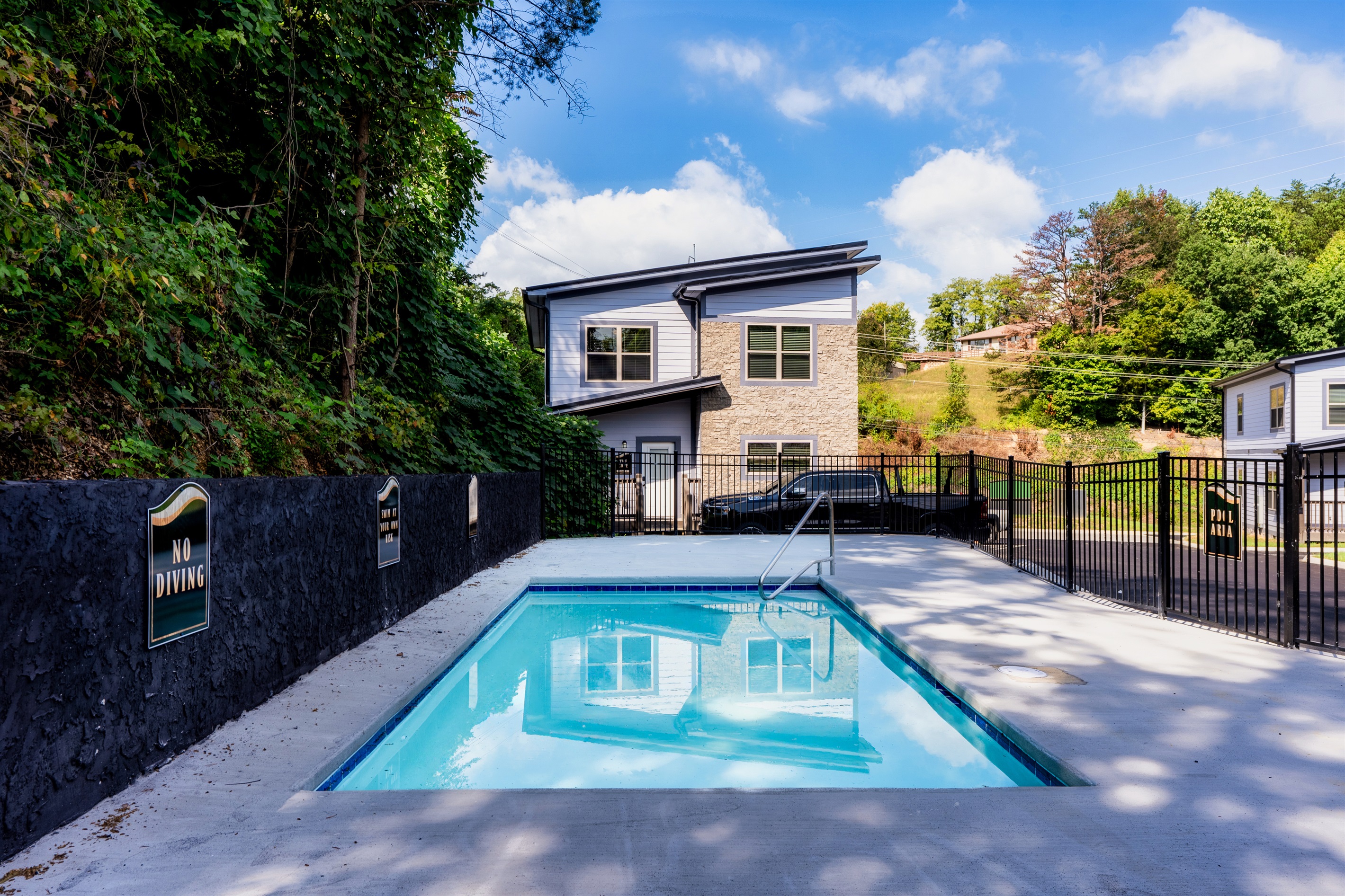 Take a refreshing dip in the sparkling pool or watch your kids enjoy endless fun at the nearby playground.