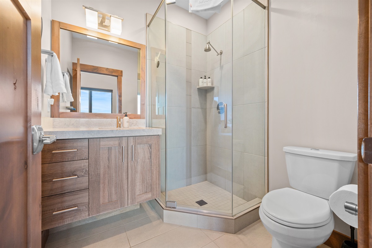 Clean, modern bathroom stocked with fresh linens