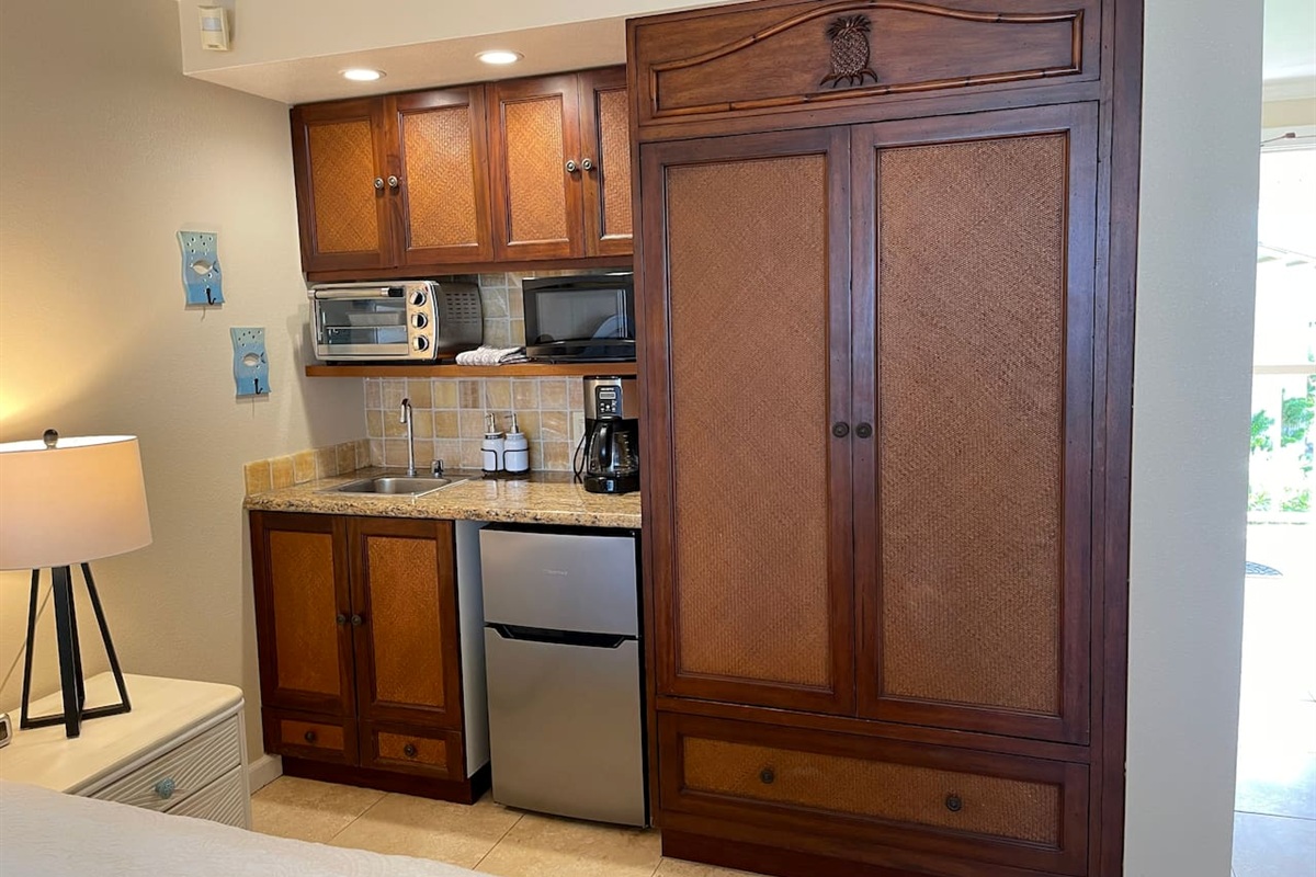 Kitchenette includes microwave, toaster oven, mini fridge and coffee maker.