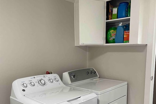 New washer and dryer with laundry detergent supplies so you don’t have to bring or buy them. 
