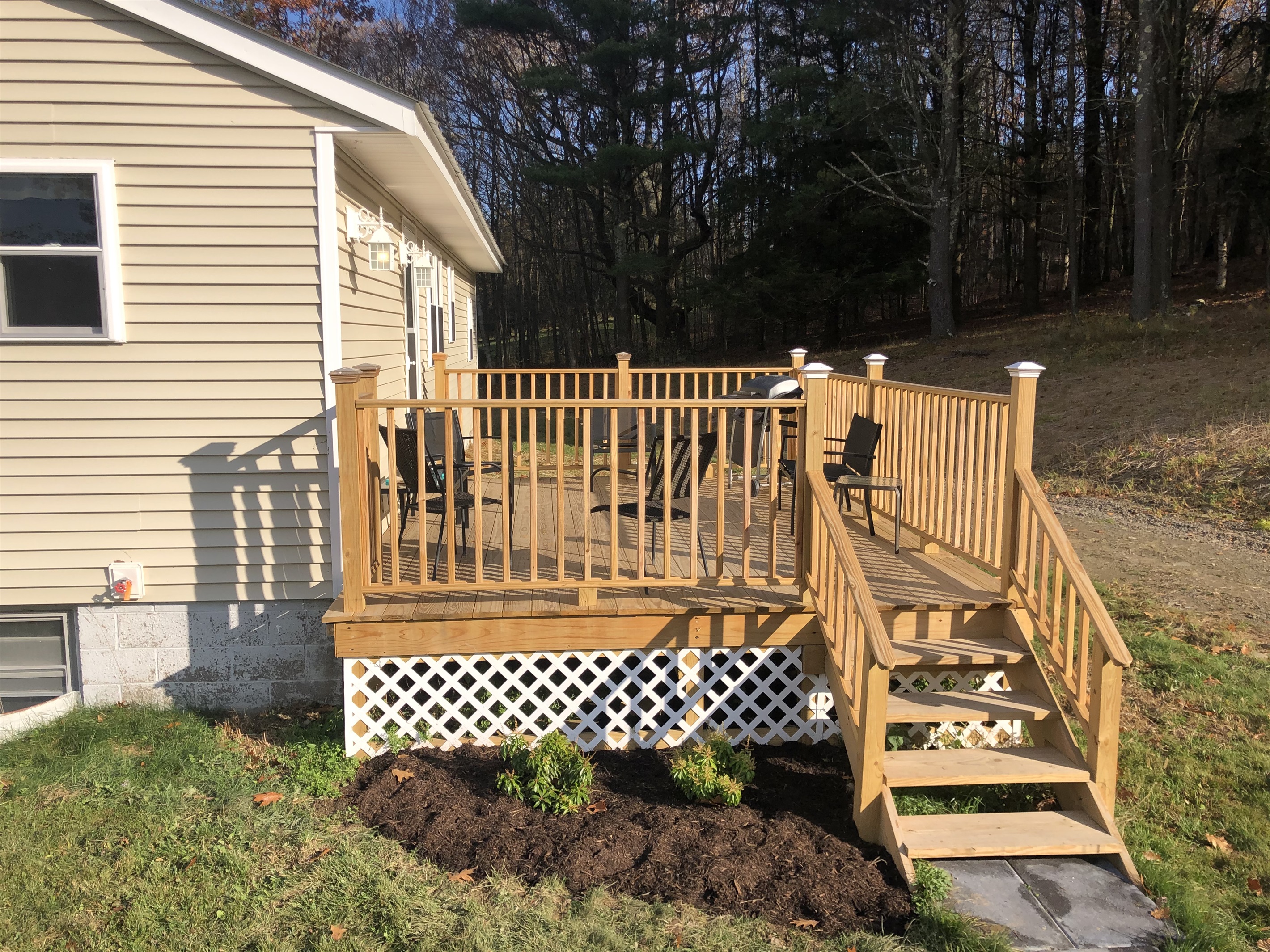 Rear deck with outdoor gas grill