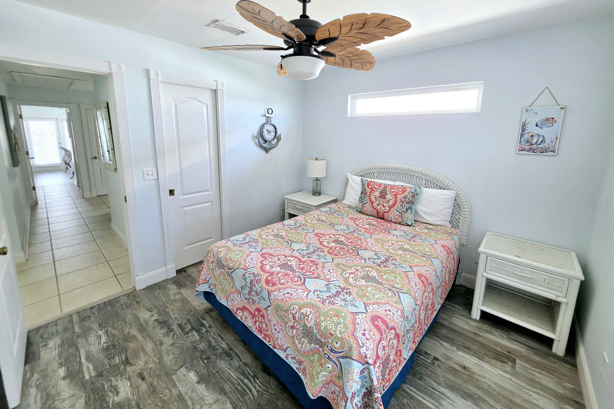 Bedroom 2 – queen bed and ceiling fan