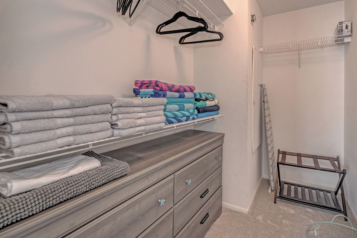 Walk in closet off the primary bedroom. This space fits a pack n' play perfectly! 