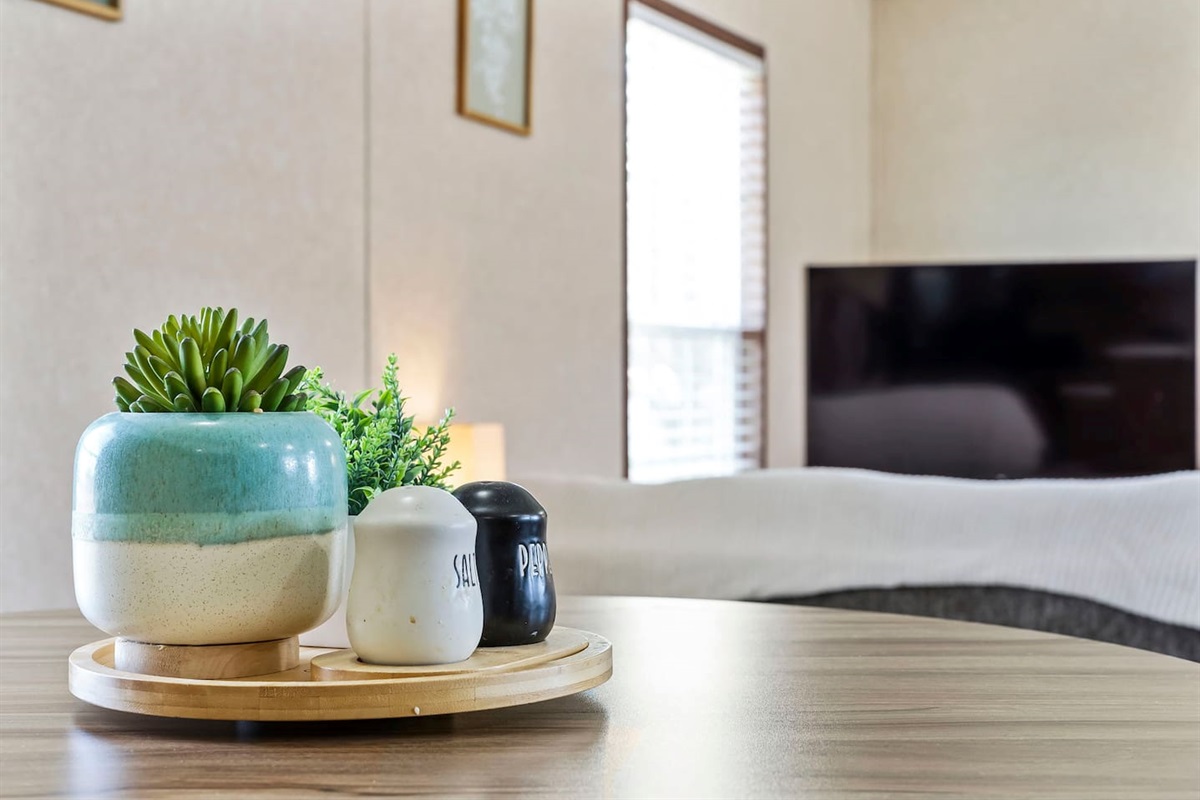 Charming tabletop details with modern décor accents, creating a warm and welcoming dining experience.