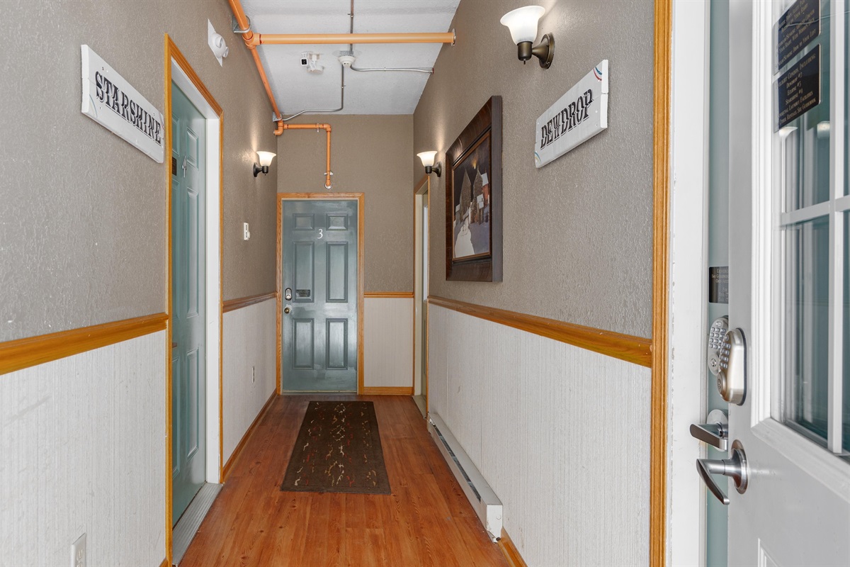 The entrance to Starshine Condo is immediately to the left after entering the shared building entrance.