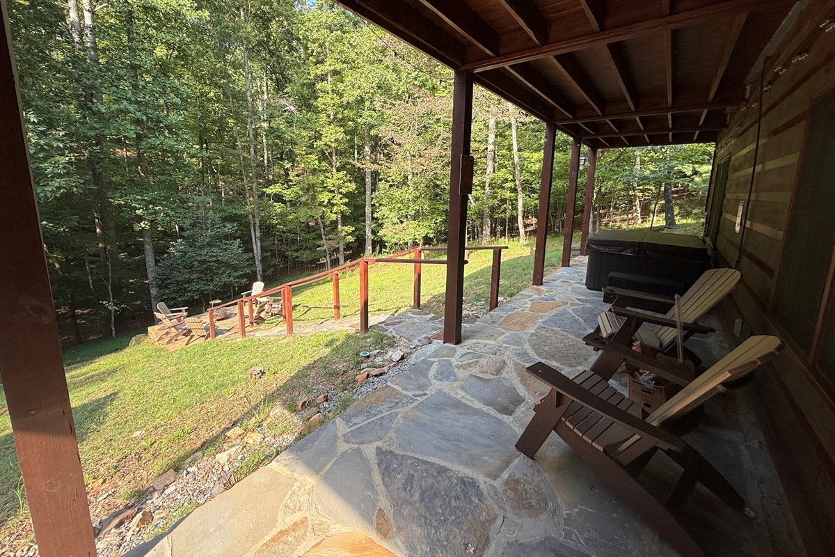 Private hot tub and stairs down to firepit. This area will be fenced in shortly to allow the fur babies to spend time with their family at all times!