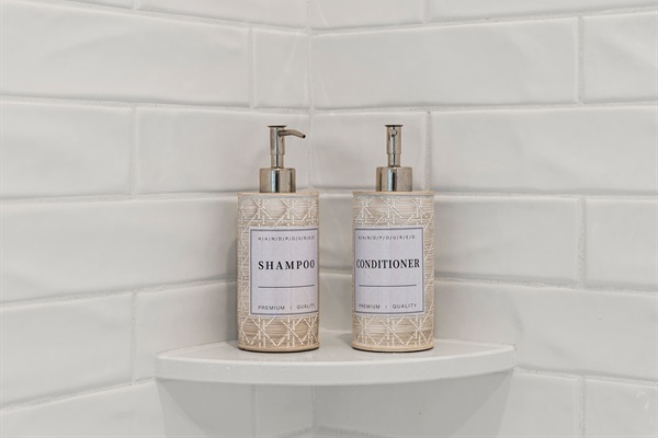 Thoughtful amenities include shampoo and conditioner for guests