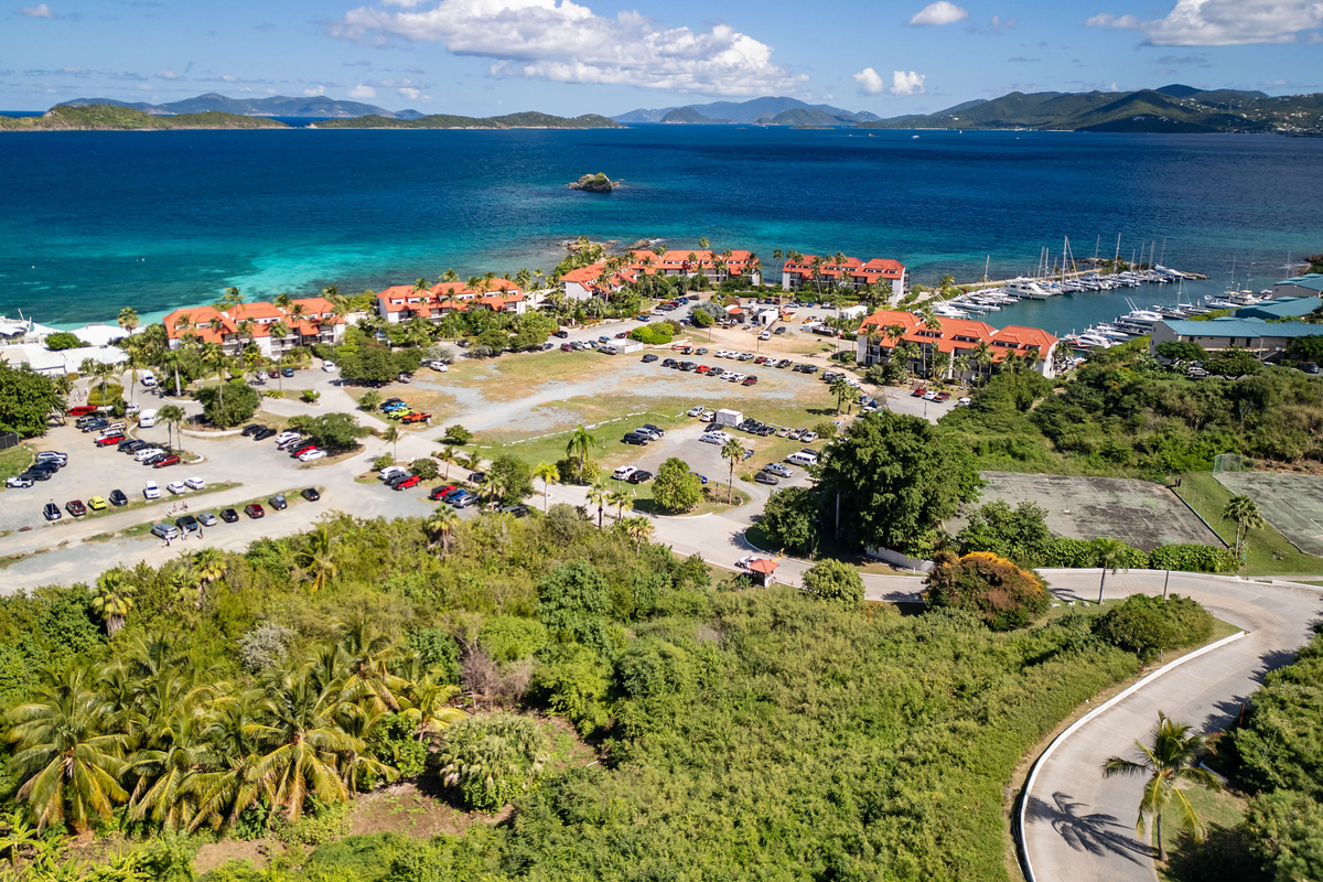 A stunning aerial view of Sapphire Beach Resort and its breathtaking Caribbean surroundings.