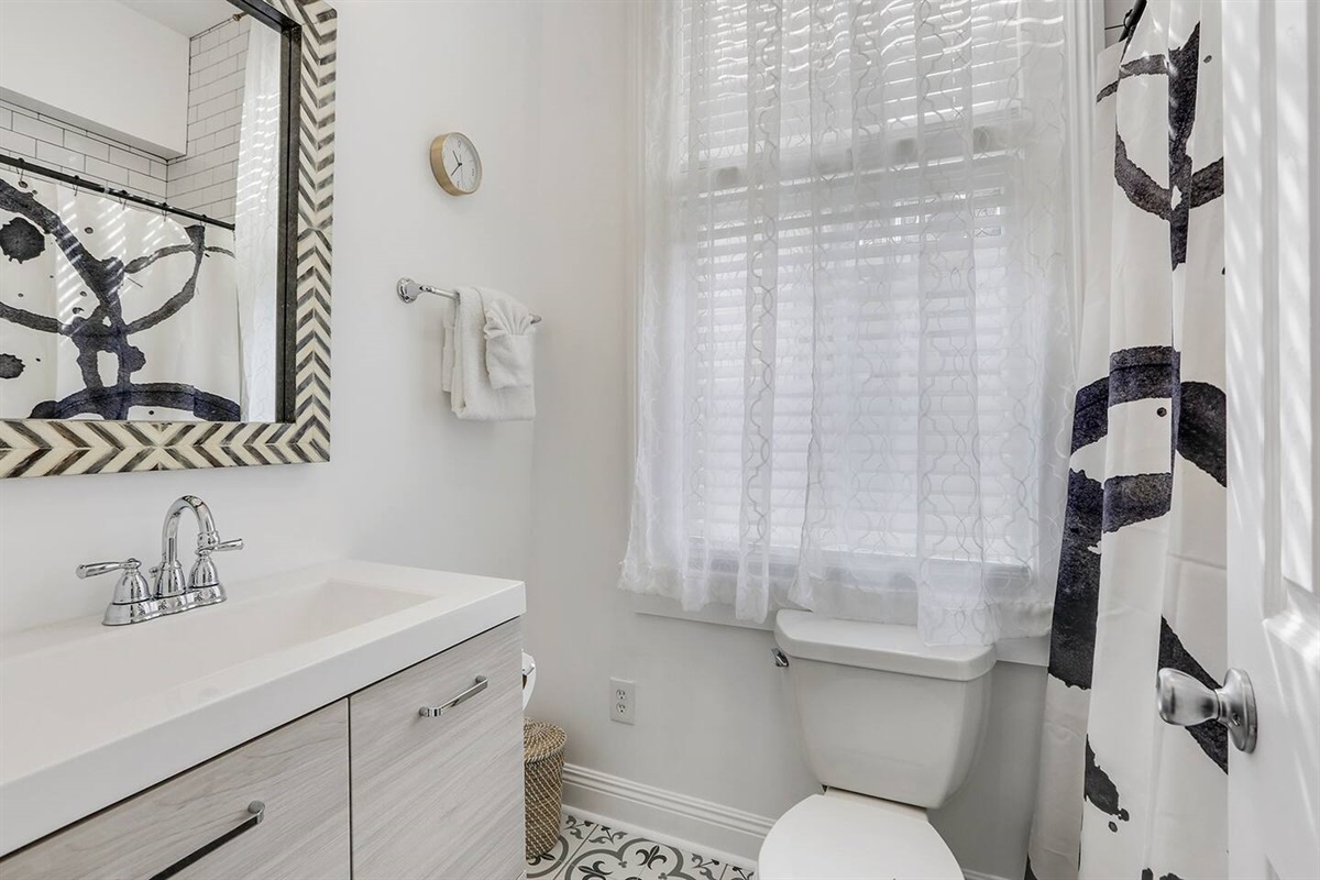 Full bathroom with shower/tub.