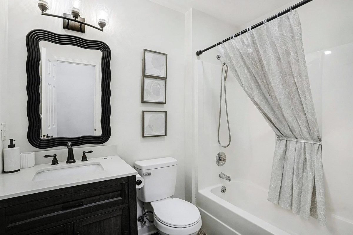 Upstairs full bathroom with tub and shower — 2.5 baths means no morning lines