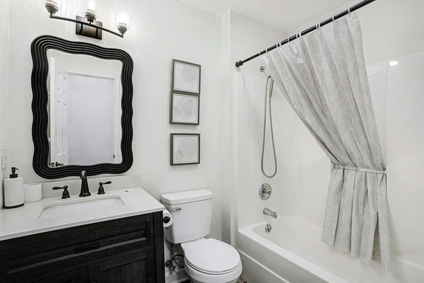 Upstairs full bathroom with tub and shower — 2.5 baths means no morning lines