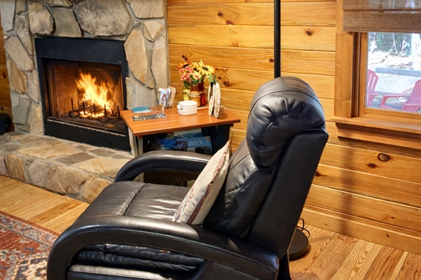 Your favorite seat in the cabin—sink into the recliner, watch the fire glow, and let the mountains slow everything down.