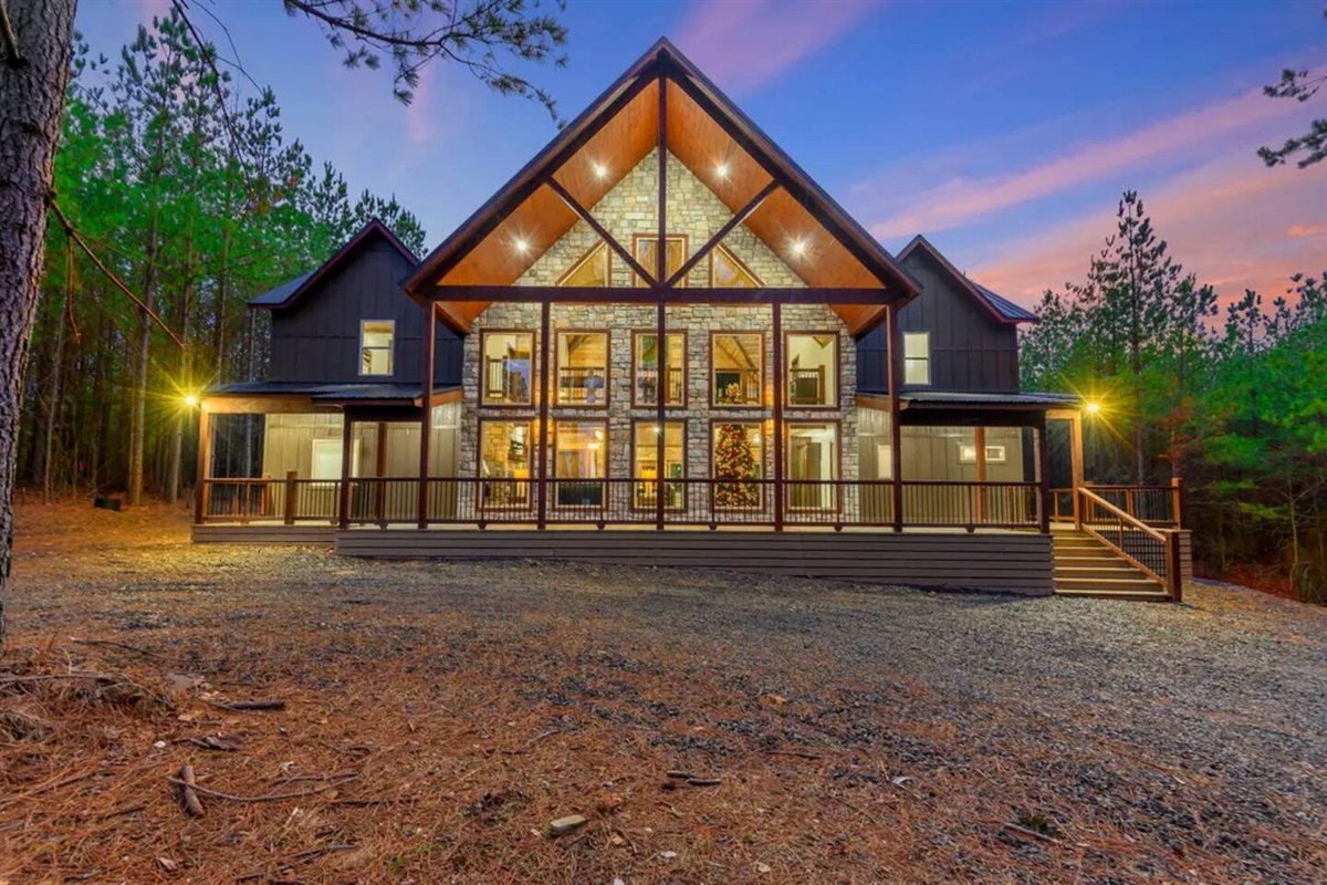 Welcome to your forest retreat — a luxury cabin tucked among towering pines just minutes from Beavers Bend State Park and Broken Bow Lake, where every sunrise feels like your own private mountain escape.