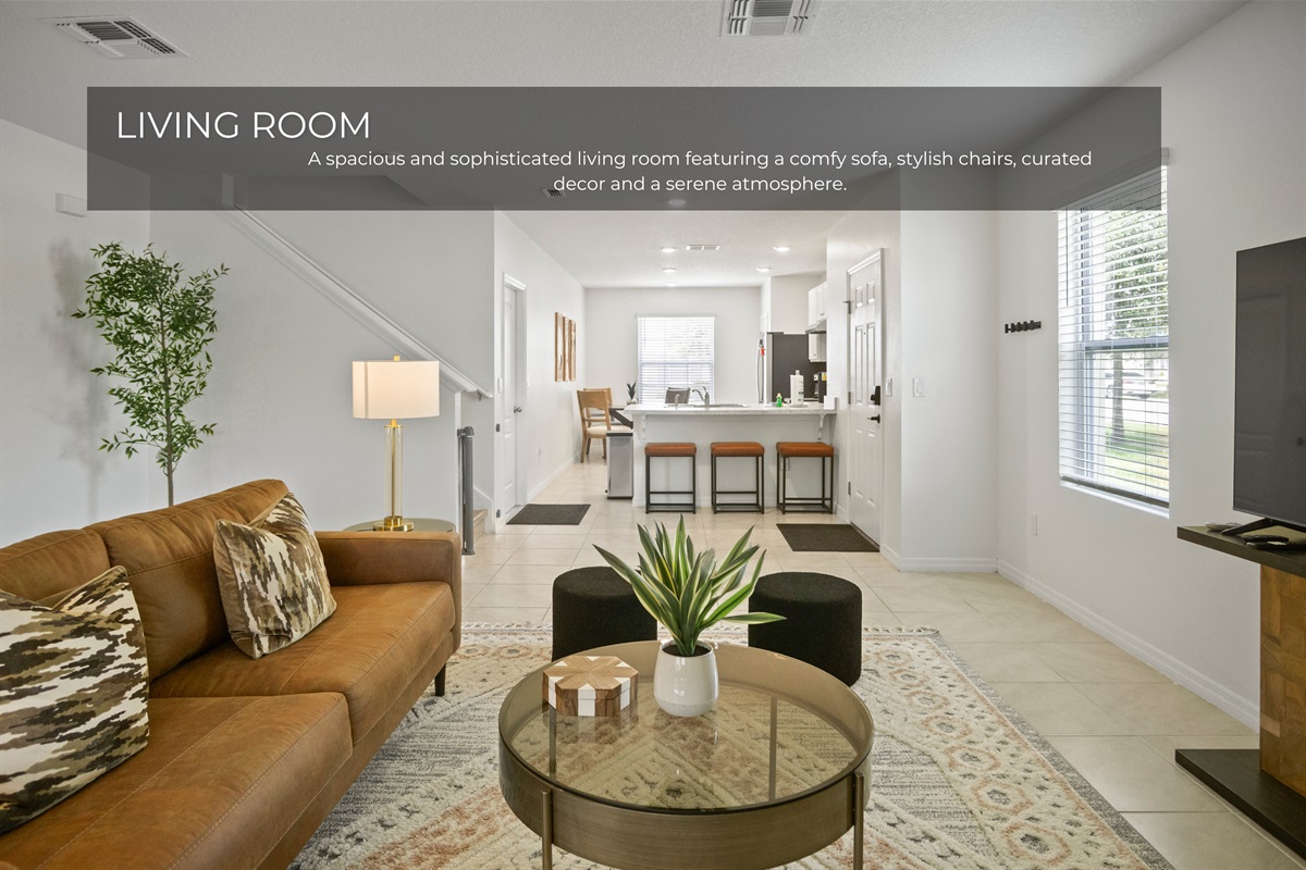 Beautifully furnished living room with warm touches.