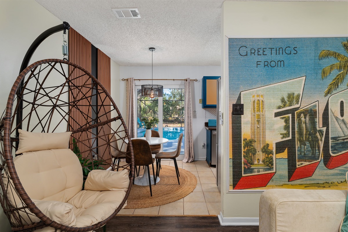 View from family room into dining area - view of pool