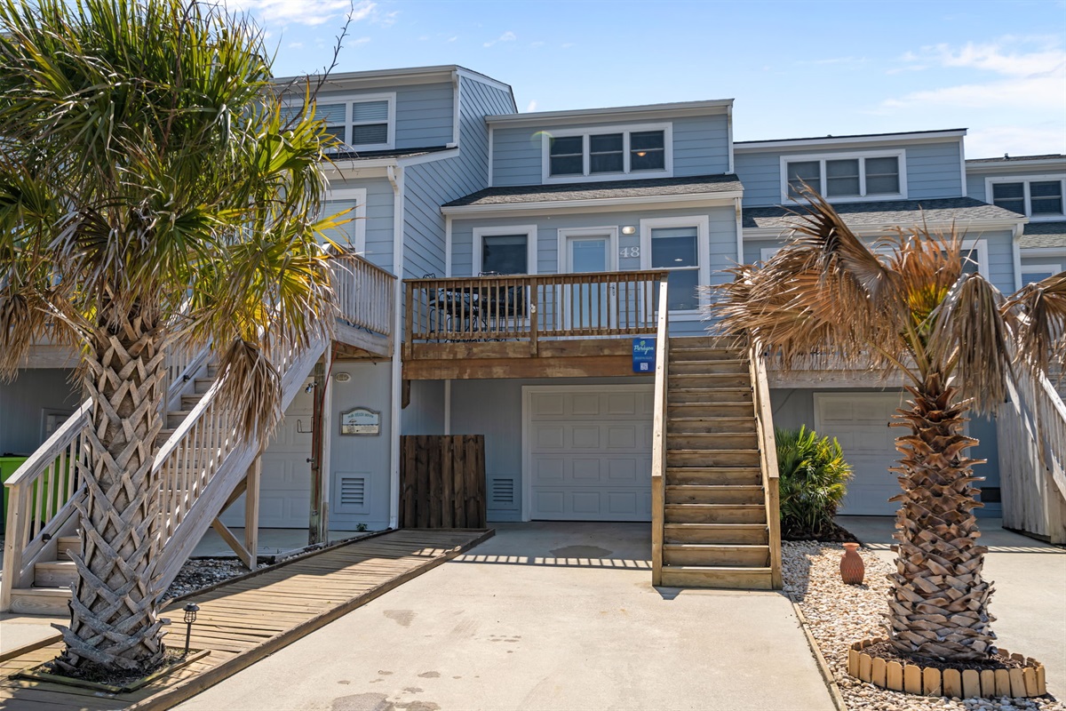 Front exterior with parking and private entrance