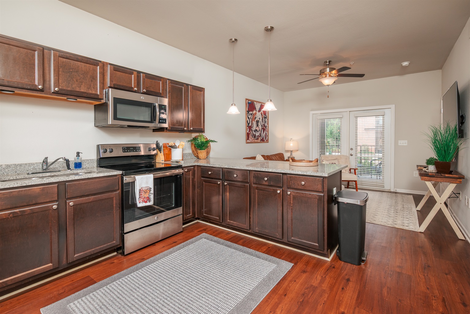 Whip up breakfast before the game or enjoy late-night snacks in the fully stocked kitchen with stainless appliances and an open layout made for hanging out.”