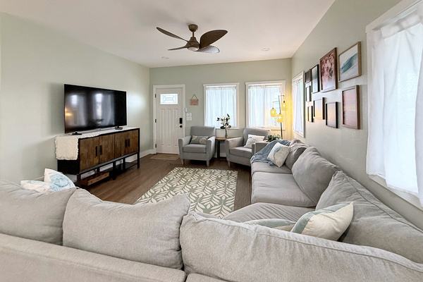 Living Room | Representative Interior. Finishes, decor, and furniture, vary by duplex unit.