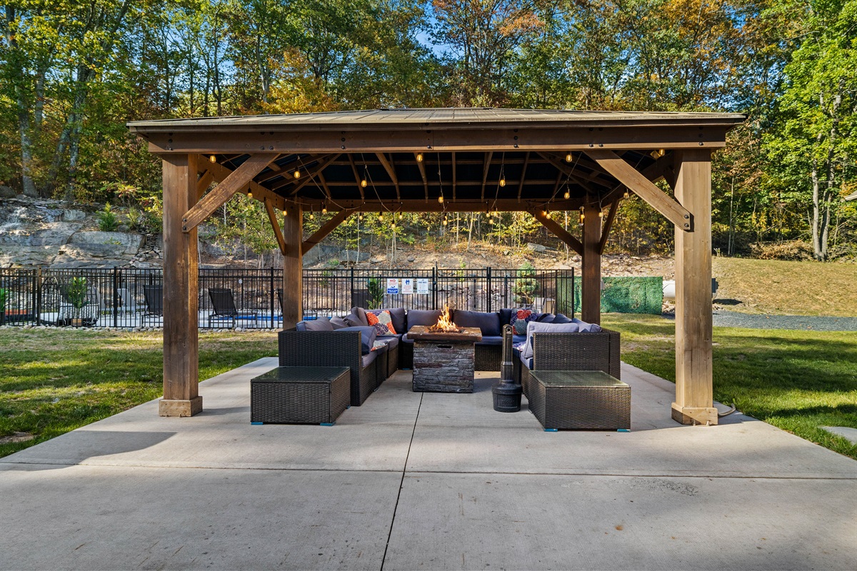 Cozy gazebo with firepit