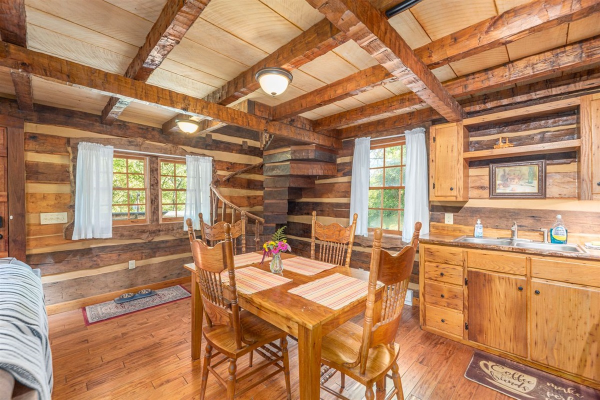 Notice in the front right corner is the timber staircase going to the loft. 