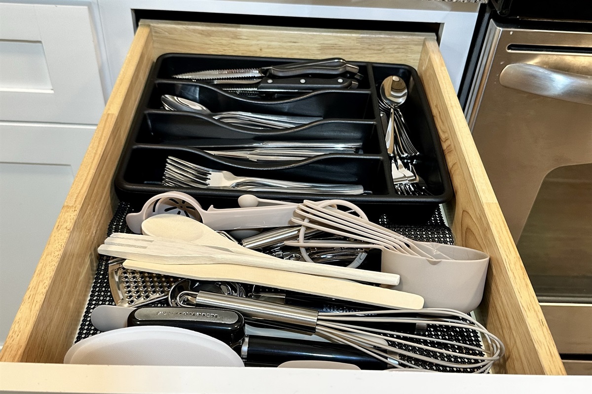 Plenty of silverware and essential kitchen gadgets