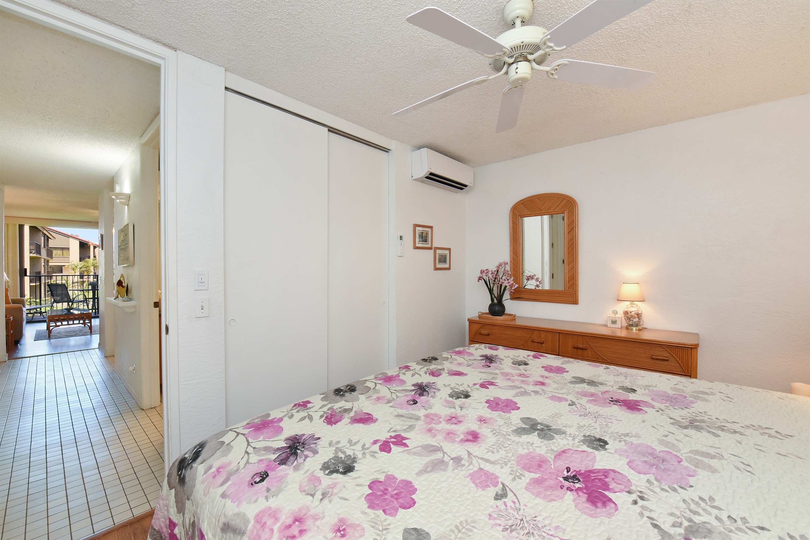 AC unit with remote in bedroom