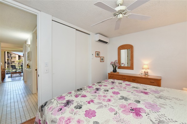 AC unit with remote in bedroom