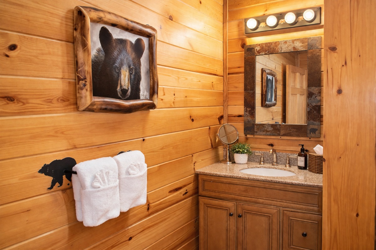 Full bathroom on the main level just off of Bedroom 1.