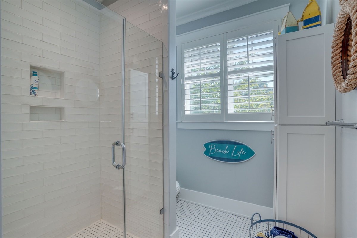 Walk-in shower with tile surround