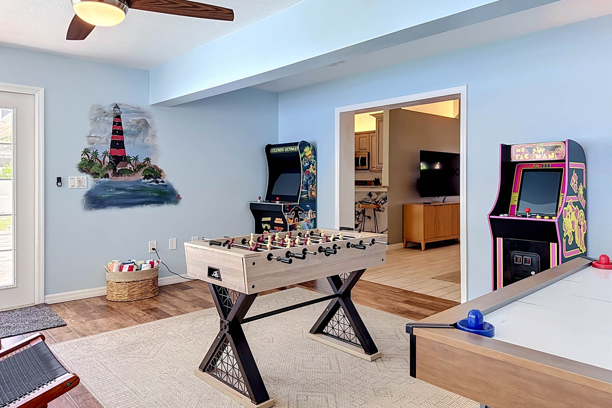 Family Fun Zone – Dive into nonstop entertainment with vintage arcade games, foosball, and more in this vibrant game room.