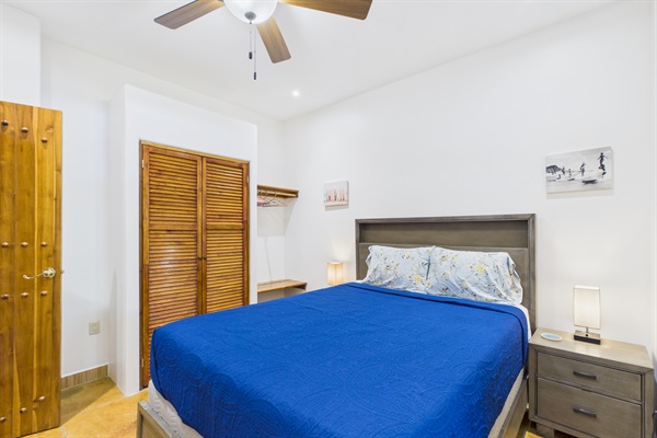 Bedroom 2.  AC. Queen bed and full bathroom that is shared with living room.
