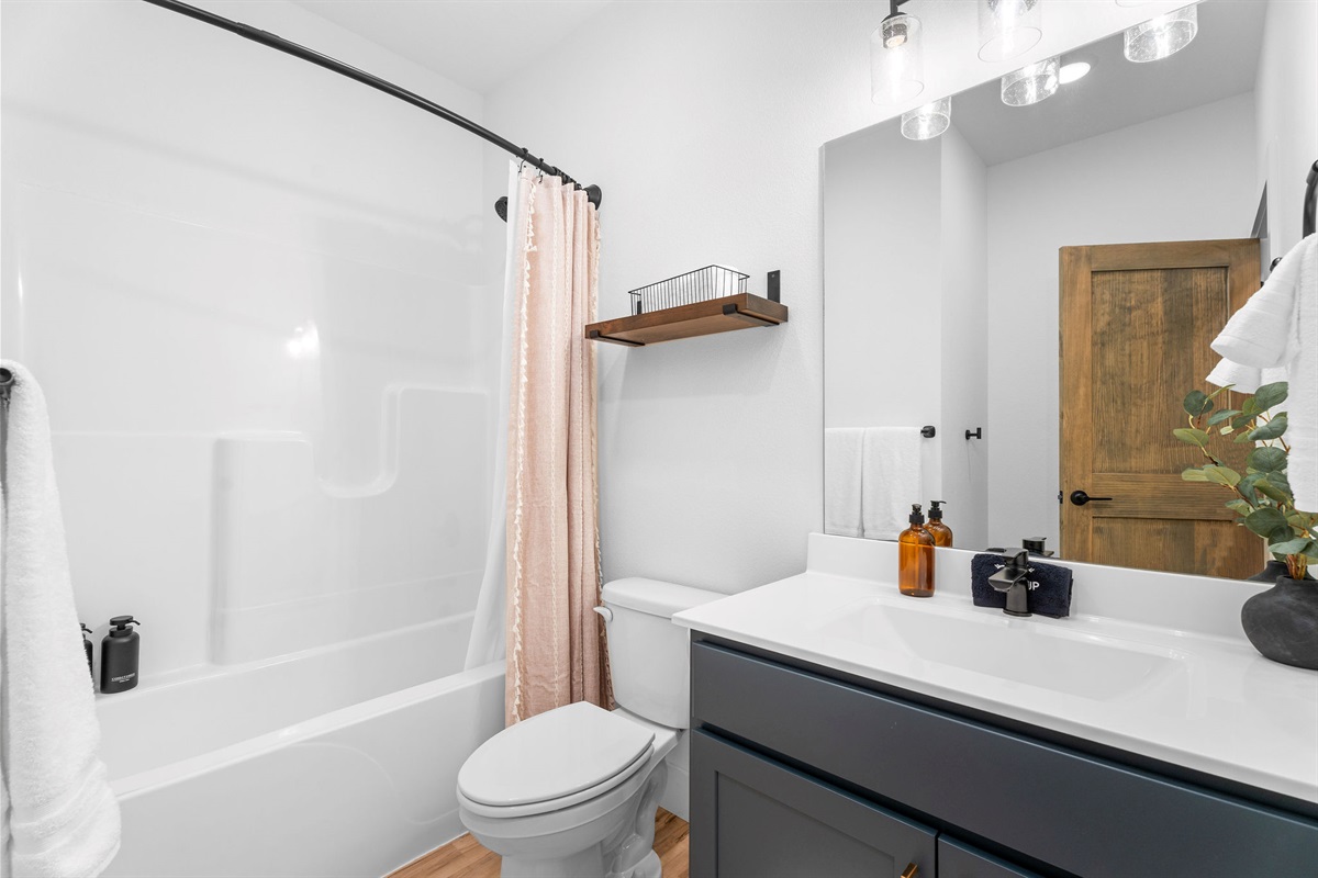 Bright, well-appointed bathroom with everything you need.