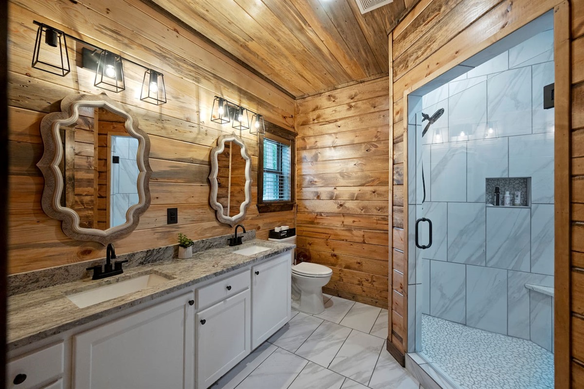 Dual vanities and dual-head showers mean no waiting, just relaxation.