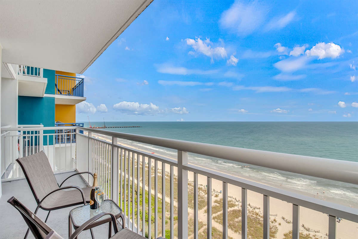 Sip your morning coffee with panoramic views in this balcony!