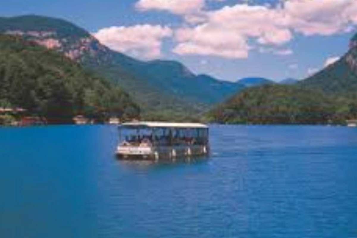 Boating on beautiful Lake Lure! Boat tours, rentals, kayak and wakeboard rentals available . Opens May 2026